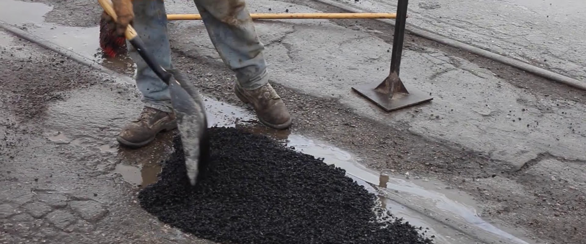 Repairing Asphalt Potholes with Cold Patch Mix