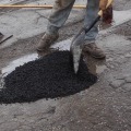 Repairing Asphalt Potholes with Cold Patch Mix